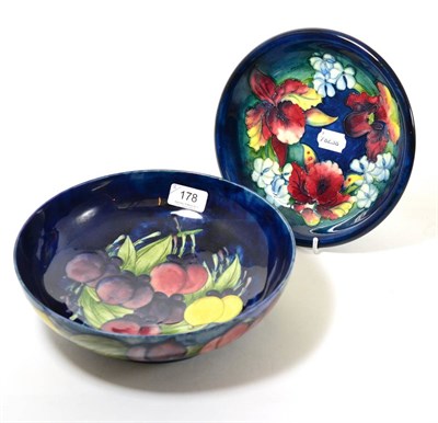 Lot 178 - Moorcroft Orchid pattern dish and Wisteria pattern circular bowl (2)