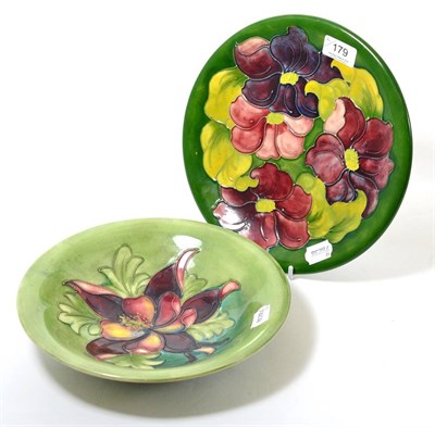 Lot 179 - Moorcroft Clematis pattern plate and Hibiscus bowl (2)