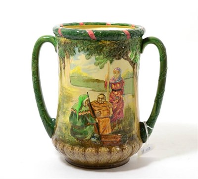 Lot 181 - A Royal Doulton twin-handled Robin Hood loving cup, designed by Harry Fenton and Charles Noke,...