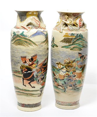 Lot 185 - Two Japanese Satsuma vases decorated with warriors and moulded dragons (a.f.)