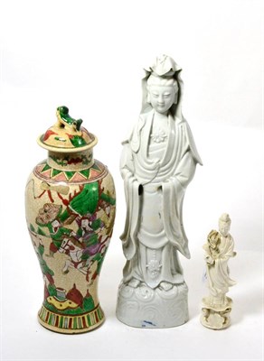 Lot 195 - A blanc de chine figure of Guanyin together with a small figure of Guanyin and a Chinese...