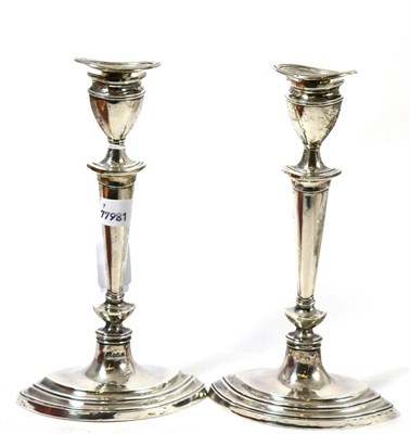 Lot 204 - A pair of silver candlesticks (loaded bases)