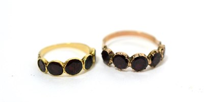 Lot 222 - Two foil backed five stone garnet rings (both with box)