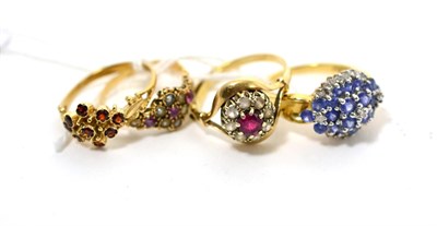 Lot 223 - Four stone set dress rings