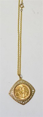 Lot 245 - A 1912 sovereign in a 9ct gold mount and a chain stamped '9K'