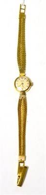 Lot 251 - A lady's Nisus wristwatch, the strap stamped 750