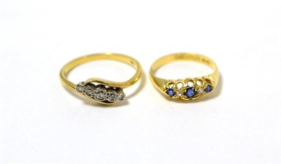 Lot 252 - A five stone diamond ring stamped 18ct and a 18ct gold sapphire and diamond ring