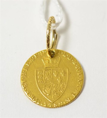 Lot 253 - A George II spade guinea, drilled and mounted as a keyring