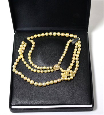 Lot 257 - A double strand cultured pearl necklace with 9ct gold snap