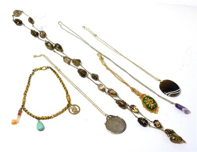 Lot 261 - Five assorted necklaces, and a gilt watch guard