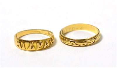 Lot 266 - An 18ct gold MIZPAH ring and an 18ct gold band ring