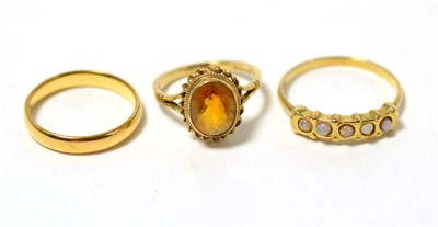 Lot 270 - Three gold rings, including one wedding band