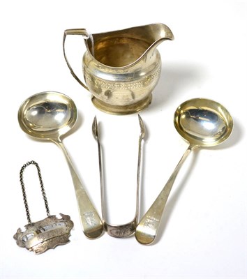 Lot 272 - George III 1804 silver milk jug, a pair of 1797 sauce ladles, a Georgian madeira/gin label and...