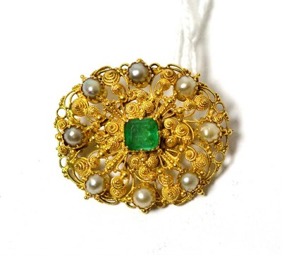 Lot 281 - An emerald and split pearl brooch, the oval form with cannetille decoration, measures 3.3cm by 3cm