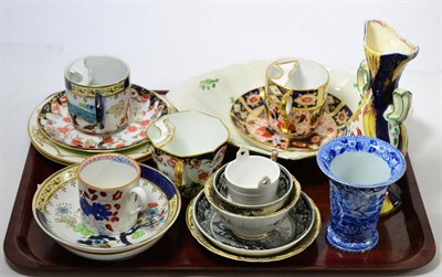 Lot 334 - A blue and white spill vase and a collection of early 19th century ceramics, cups and saucers etc