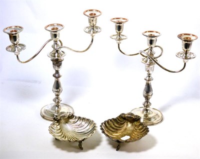 Lot 346 - Pair of plated three branch candelabra and a pair of plated decorative shell shaped dishes