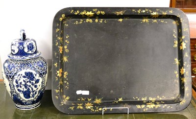 Lot 372 - Black papier mache tray with floral painted decoration and a modern decorative blue and white...