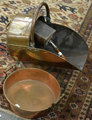 Lot 379 - A copper coal hod and shovel and a two handled copper pan