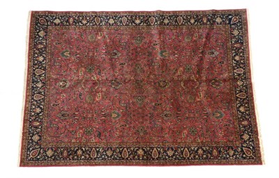 Lot 695 - Lahore Carpet Punjab, India, circa 1920 The coral pink field with an all over design of...