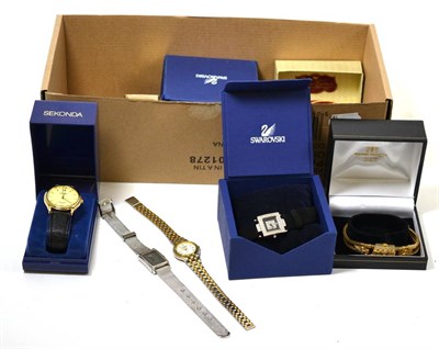 Lot 383 - A quantity of wristwatches, including Swarovski, Sekonda, Tissot, and a watch/lighter