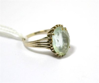 Lot 405 - A lady's aquamarine dress ring stamped 750