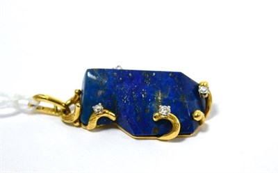 Lot 407 - An 18ct gold lapis lazuli and diamond set pendant