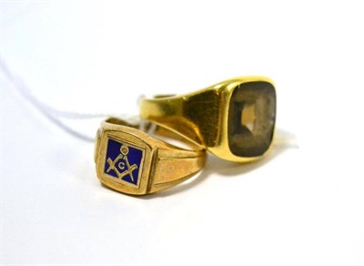 Lot 408 - A gentleman's 9ct gold and enamel Masonic signet ring and a gentleman's topaz set signet ring (2)