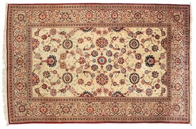 Lot 701 - Kashan Silk Rug Central Iran, circa 1950 The cream field with an all over design of palmettes...