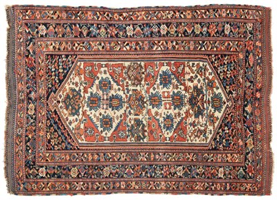 Lot 702 - Afshar Rug South East Iran, 19th century The ivory lozenge field of stylised flowerheads framed...