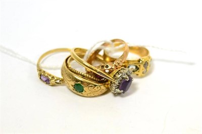 Lot 434 - Four 9ct gold stone set dress rings (a.f.), an amethyst and diamond cluster ring and a stone...