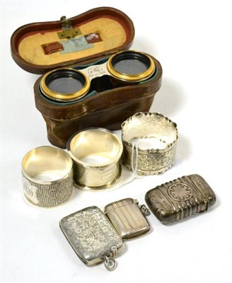 Lot 439 - Three vestas, three napkin rings and a pair of opera glasses