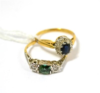 Lot 445 - An 18ct gold sapphire and diamond cluster ring and a green tourmaline and diamond three stone...