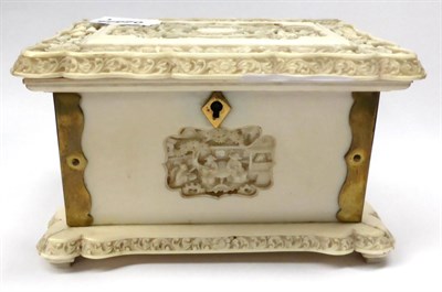 Lot 461 - A late 19th century ivory carved jewellery case/musical box