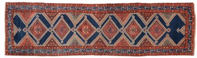 Lot 707 - Luri Runner West Iran, circa 1920 The Indigo field with a column of stepped medallions framed...