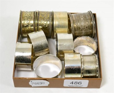 Lot 486 - A collection of eleven napkin rings, 19th century and later