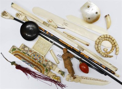 Lot 488 - A box with 19th century tortoiseshell and ivory back scratchers, Chinese ivory snake with coral...