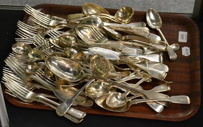 Lot 490 - A composite early 19th century silver fiddle pattern cutlery service, dragonhead crest...