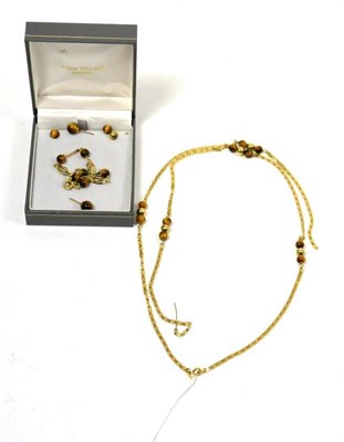 Lot 493 - A 9ct gold tigers-eye necklace, bracelet and pair of earrings