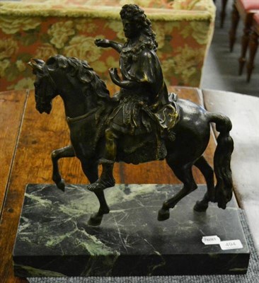 Lot 494 - A French equestrian bronze of Louis XIV after model by Francois Girardon, on a green marble plinth