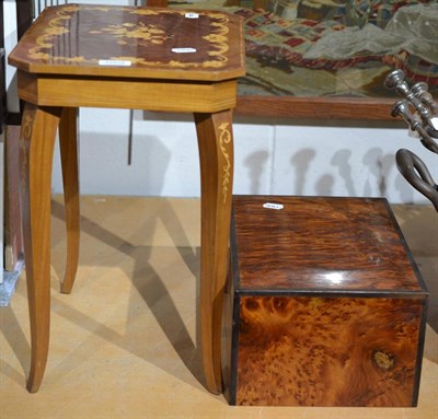 Lot 1002 - A modern hinged jewellery box and a modern musical hinged occasional table