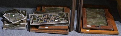 Lot 1008 - Assorted leaded and stained glass panels, some fitted with oak mounts