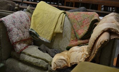 Lot 1016 - Green and red paisley quilt, yellow quilt with green floral border and two eiderdowns (4)