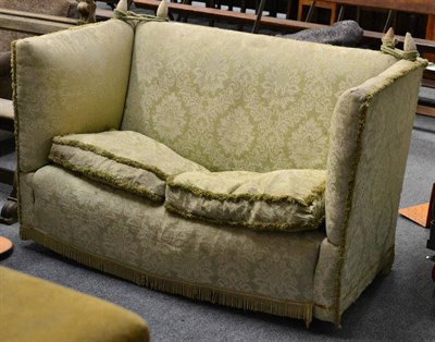 Lot 1017 - A green damask upholstered knole settee