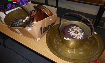 Lot 1024 - A 19th century copper and brass ware, an Indian tray, jam pans and a circular footstool