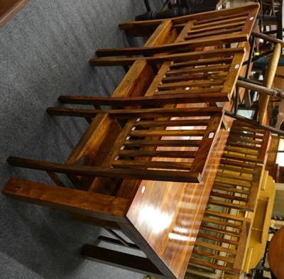 Lot 1032 - A modern fruitwood dining table together with a set of six chairs and matching sideboard