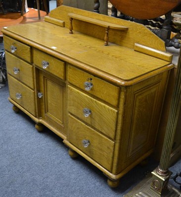 Lot 1038 - A Victorian scumbled pine dresser