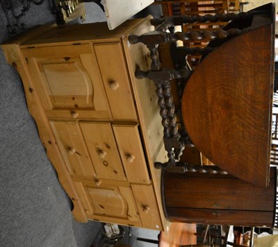 Lot 1045 - A pine sideboard, Georgian oak bow front corner cabinet and an oak drop leaf table (3)