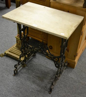 Lot 1046 - A cast iron and marble table