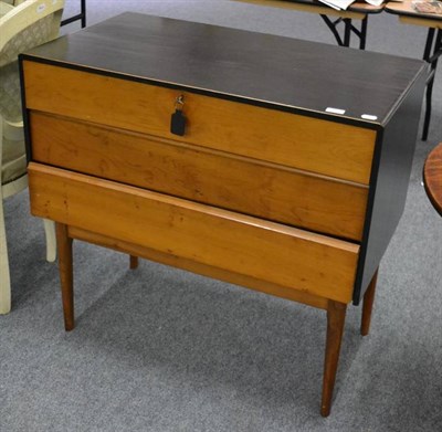 Lot 1131 - A mid 20th century pine and ebonised secretaire chest, the top drawer with pigeon holes and...