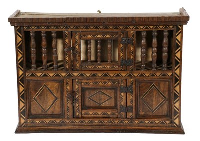 Lot 729 - An Oak and Parquetry Decorated Mural Food Cupboard, with balustrade hinged door flanked by two...